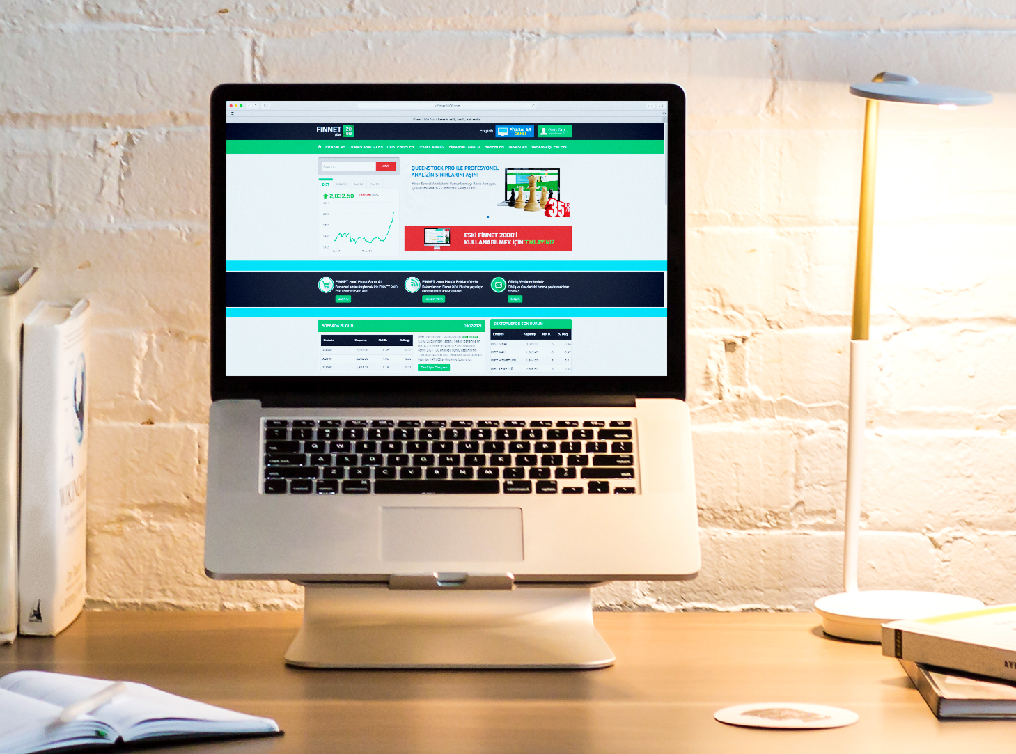 FİNNET 2000 PROGRAMINA ZİRAAT YATIRIM İNTERNET ŞUBESİNDEN ÜCRETSİZ ERİŞİM!" başlığıyla, sağ tarafında bir masa üzerinde Finnet 2000 web sitesi açık olan dizüstü bilgisayarı gösteren, sol tarafında "Detaylı Bilgi" butonu yer alan kırmızı arka planlı web si